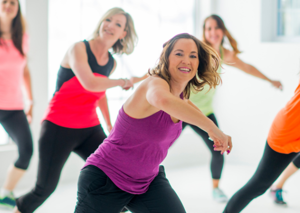 group of women doing aerobics exercise