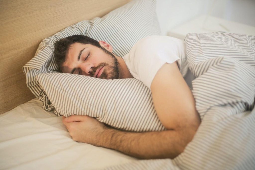 guy sleeping soundly - featured image