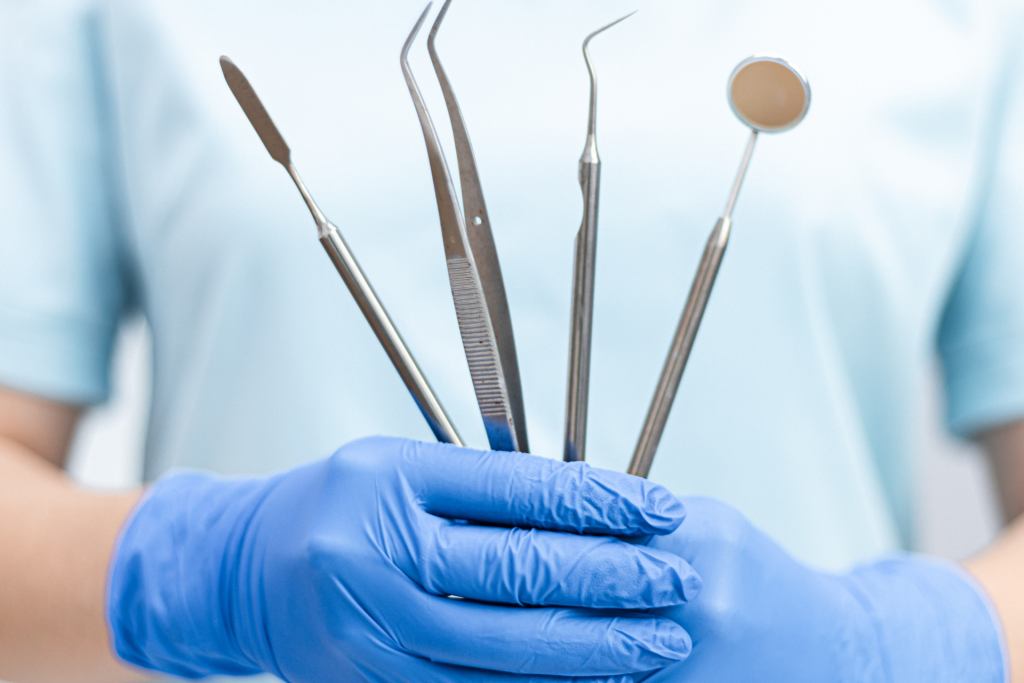 dentist with tools - featured image