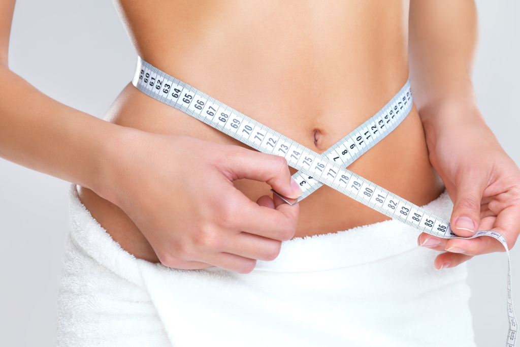 woman measuring waist - featured image
